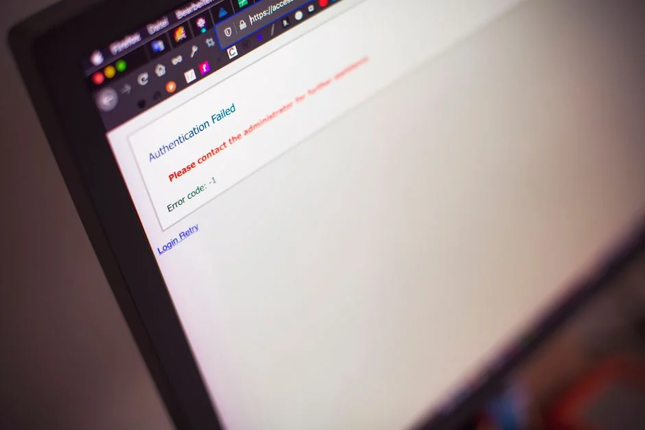 Businesswoman working on laptop with Android 6.0 Marshmallow webpage open.